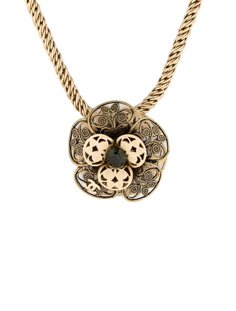 chanel camelia necklace.